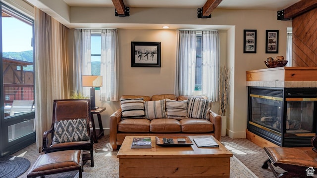 1456 W Newpark Blvd Unit 213, Park City, UT 84098 - living room featuring beam ceiling and a fireplace