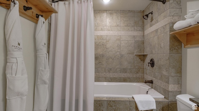 1456 W Newpark Blvd Unit 213, Park City, UT 84098 - bathroom featuring tiled shower / bath combo and toilet