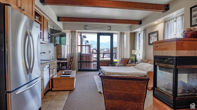 1456 W Newpark Blvd Unit 213, Park City, UT 84098 - bedroom featuring freestanding refrigerator, beamed ceiling, light colored carpet, access to outside, and light tile patterned floors