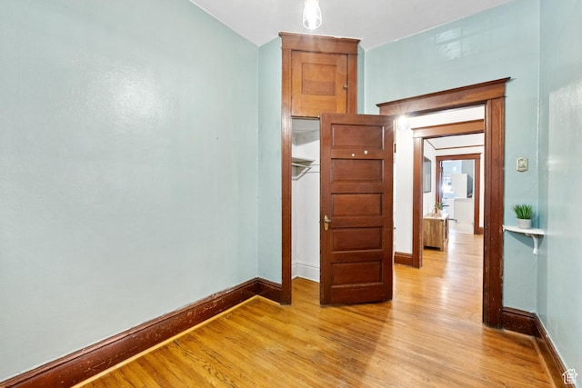 310 S 300 E Unit A2, Salt Lake City, UT 84111 - unfurnished bedroom with light wood finished floors and baseboards