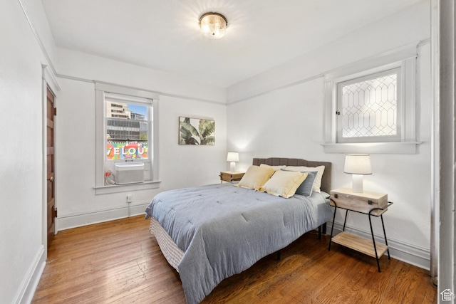 310 S 300 E Unit A2, Salt Lake City, UT 84111 - bedroom with wood finished floors and cooling unit