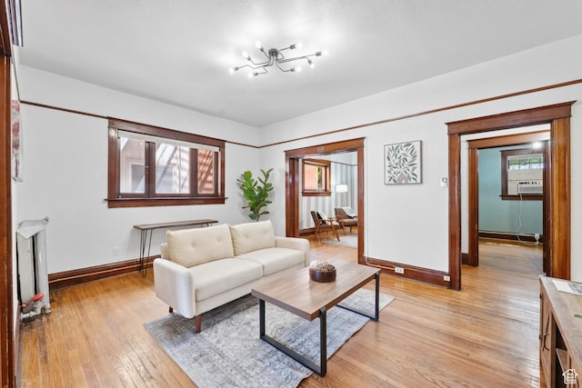 310 S 300 E Unit A2, Salt Lake City, UT 84111 - living room with plenty of natural light, light wood-style flooring, a chandelier, and cooling unit