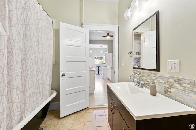 310 S 300 E Unit A2, Salt Lake City, UT 84111 - bathroom featuring tasteful backsplash, vanity, and tile patterned floors
