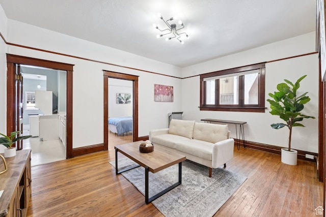310 S 300 E Unit A2, Salt Lake City, UT 84111 - living area featuring baseboards and light wood finished floors