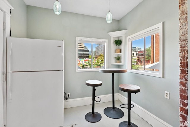 310 S 300 E Unit A2, Salt Lake City, UT 84111 - kitchen featuring freestanding refrigerator and healthy amount of natural light