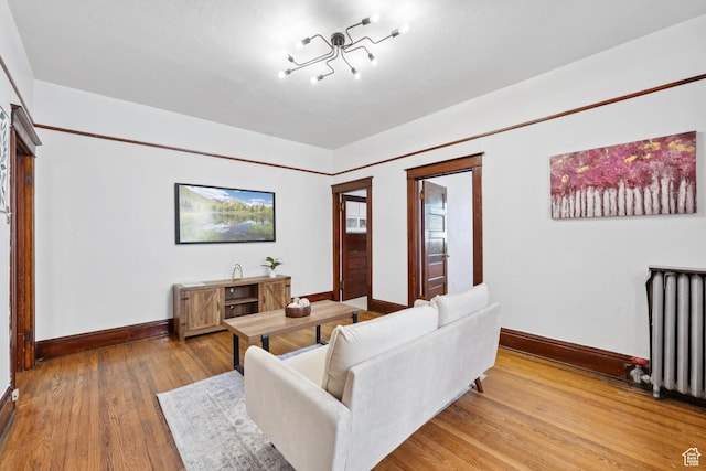 310 S 300 E Unit A2, Salt Lake City, UT 84111 - living room with wood finished floors and radiator heating unit