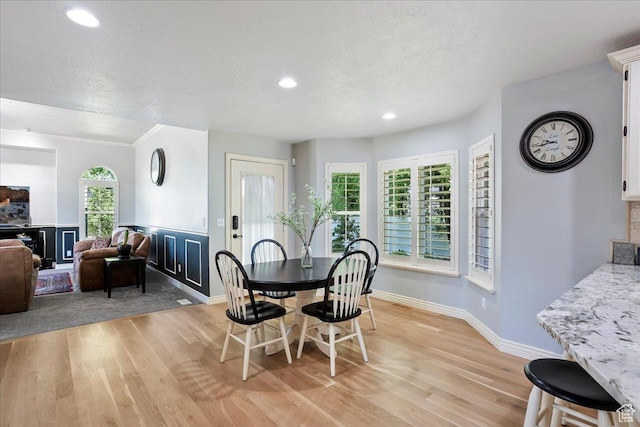 1964 N 2000 E, Layton, UT 84040 - dining room with light wood-type flooring, a textured ceiling, recessed lighting, and crown molding