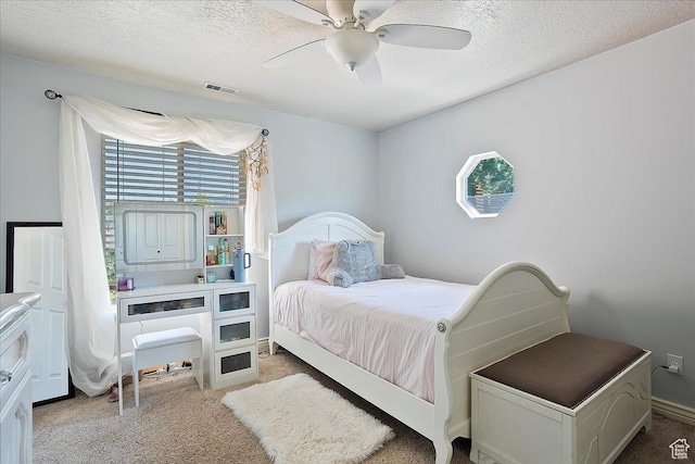 1964 N 2000 E, Layton, UT 84040 - carpeted bedroom featuring multiple windows, ceiling fan, and a textured ceiling