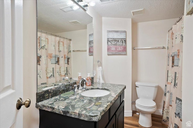 1964 N 2000 E, Layton, UT 84040 - full bath featuring vanity, wood finished floors, and a textured ceiling