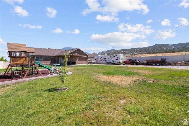 216 E 1370 S, Nephi, UT 84648 - view of grassy yard featuring a playground and a mountain view