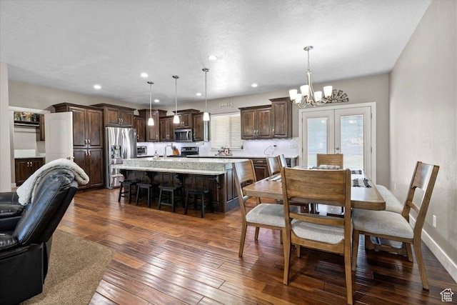 216 E 1370 S, Nephi, UT 84648 - dining area featuring dark wood-style flooring, a chandelier, and recessed lighting