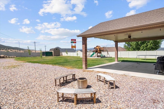 216 E 1370 S, Nephi, UT 84648 - view of home's community with a playground, a patio, and an outbuilding