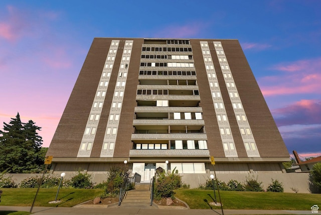 515 S 1000 E Unit 706, Salt Lake City, UT 84102 - property at dusk featuring a view of apartment building / complex