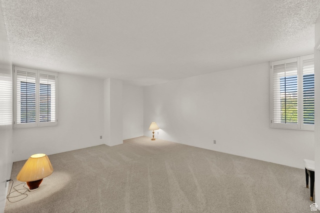 515 S 1000 E Unit 706, Salt Lake City, UT 84102 - spare room featuring carpet flooring and a textured ceiling