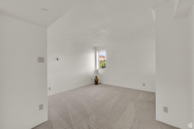 515 S 1000 E Unit 706, Salt Lake City, UT 84102 - spare room featuring carpet flooring and a textured ceiling