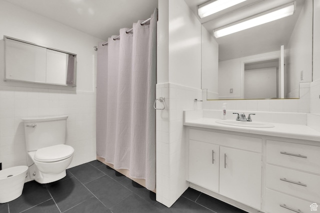 515 S 1000 E Unit 706, Salt Lake City, UT 84102 - full bath with tile patterned floors, vanity, tile walls, and curtained shower
