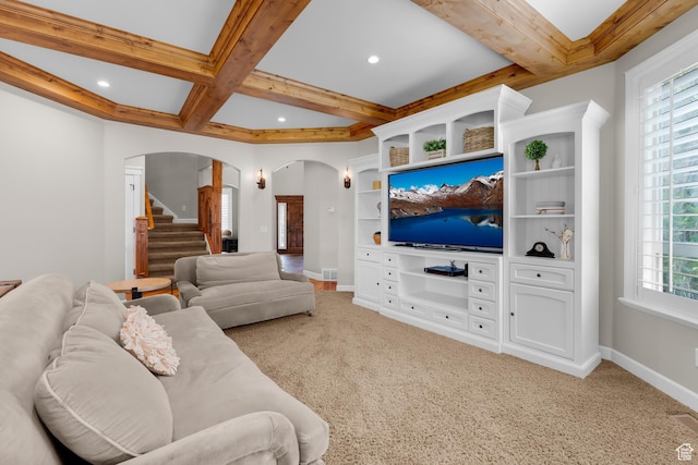 916 Ledgestone Ln, Heber City, UT 84032 - living area featuring arched walkways, beam ceiling, stairway, light carpet, and coffered ceiling
