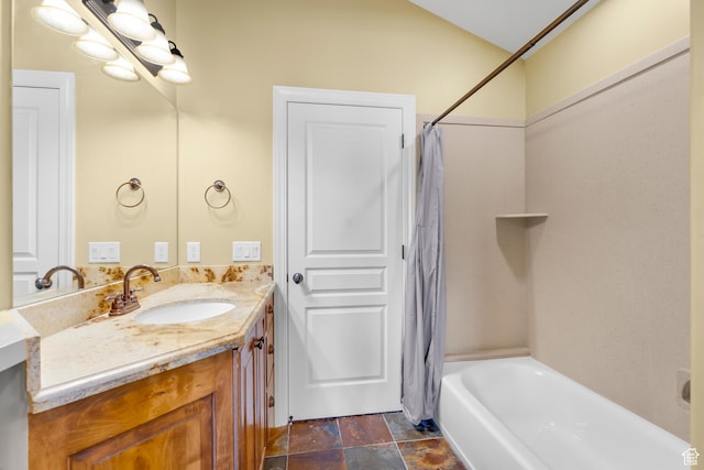 916 Ledgestone Ln, Heber City, UT 84032 - full bath featuring vanity, shower / bath combo, and stone finish flooring