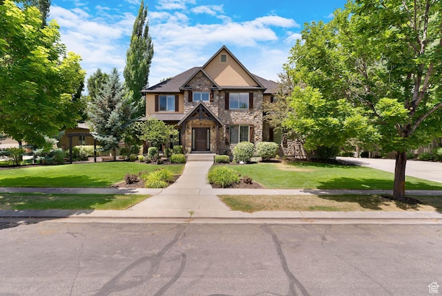 916 Ledgestone Ln, Heber City, UT 84032 - craftsman inspired home with stone siding and a front lawn