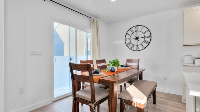 1538 E 720 N Unit 1083, Salem, UT 84653 - dining room featuring baseboards and light wood-type flooring