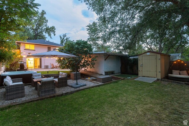 1163 E Blaine Ave, Salt Lake City, UT 84105 - view of grassy yard with a shed, a patio, and a hot tub