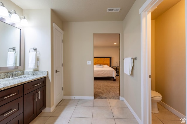 1107 W Coyote Gulch Way, Bluffdale, UT 84065 - bathroom featuring vanity, tile patterned floors, and ensuite bathroom