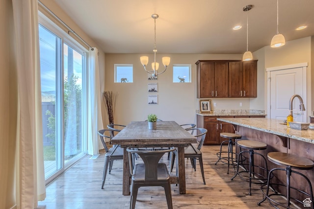 1107 W Coyote Gulch Way, Bluffdale, UT 84065 - dining space featuring light wood-type flooring, recessed lighting, and a chandelier