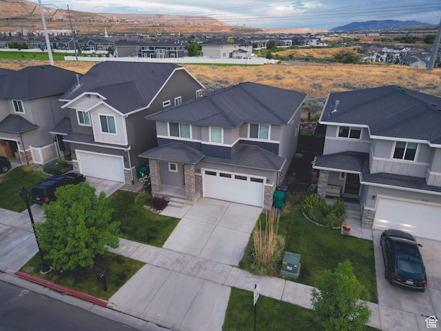 1107 W Coyote Gulch Way, Bluffdale, UT 84065 - aerial perspective of suburban area with mountains