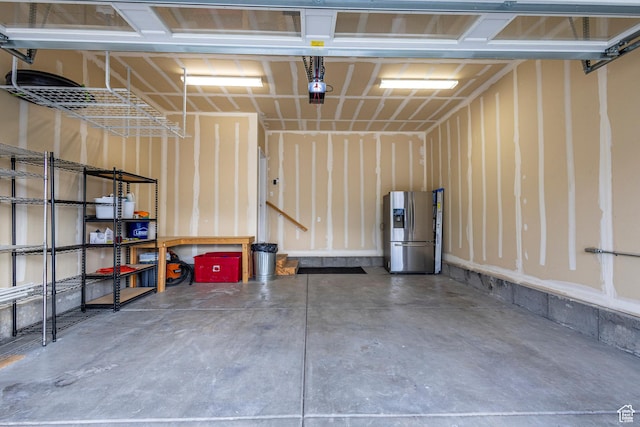 1107 W Coyote Gulch Way, Bluffdale, UT 84065 - garage with stainless steel fridge with ice dispenser