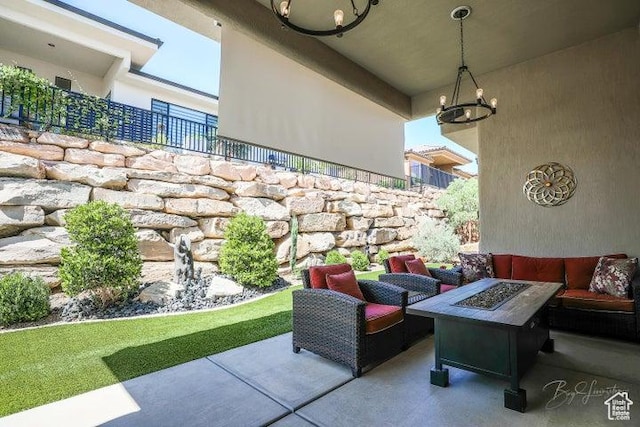 2893 W Nemi Ln, St George, UT 84770 - view of patio featuring an outdoor living space with a fire pit