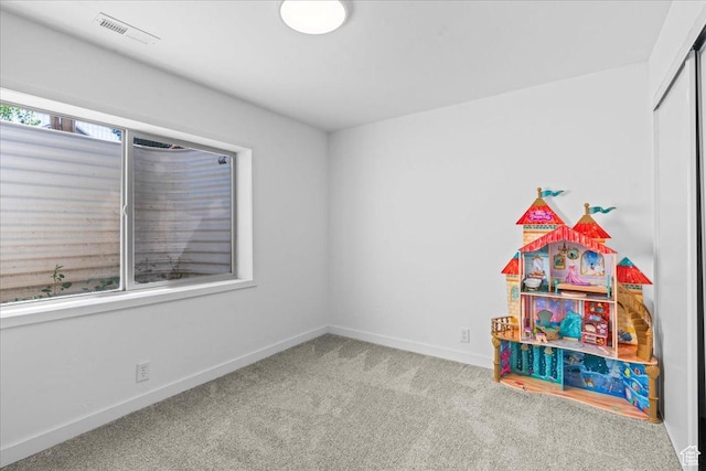 4572 S Rosa Arbor Cir W, West Valley City, UT 84128 - playroom featuring carpet and baseboards