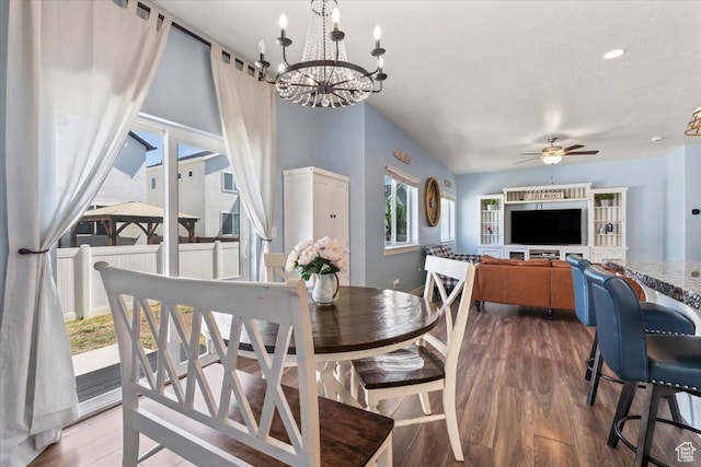 64 W 470 N, Vineyard, UT 84059 - dining space with wood finished floors, a chandelier, and ceiling fan