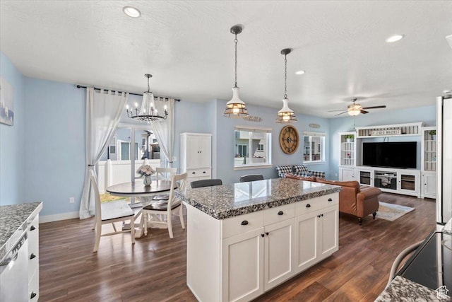64 W 470 N, Vineyard, UT 84059 - kitchen with ceiling fan, dark wood-type flooring, a kitchen island, white cabinetry, and recessed lighting