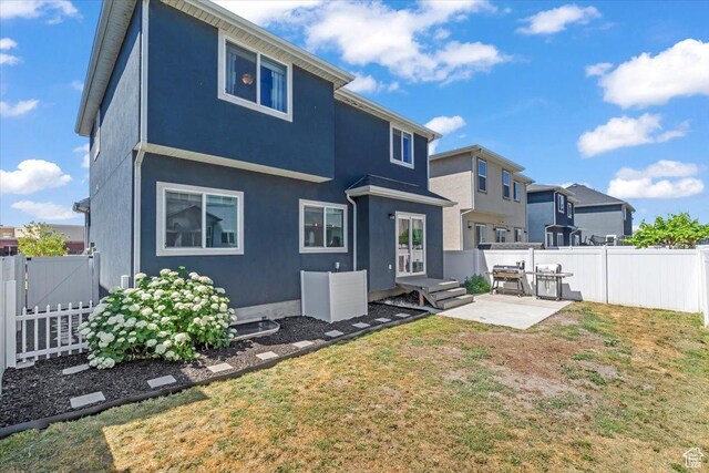 64 W 470 N, Vineyard, UT 84059 - back of house with a fenced backyard, a patio, stucco siding, and a gate