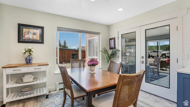 6195 Highland Dr, Park City, UT 84098 - dining room featuring french doors, light wood finished floors, baseboard heating, and recessed lighting