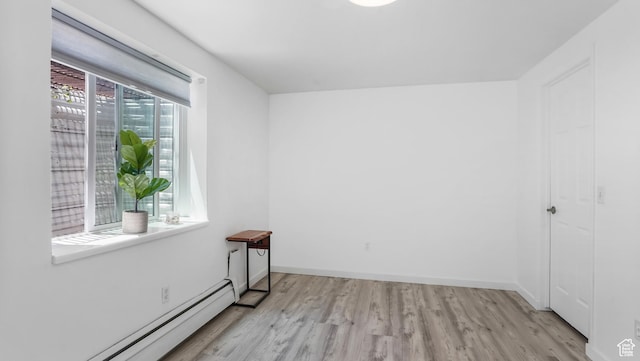 6195 Highland Dr, Park City, UT 84098 - unfurnished room featuring baseboard heating and light wood-type flooring