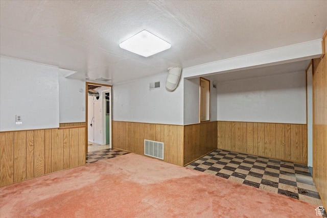 876 N 1300 W, Salt Lake City, UT 84116 - empty room featuring wainscoting, wood walls, tile patterned floors, and a textured ceiling