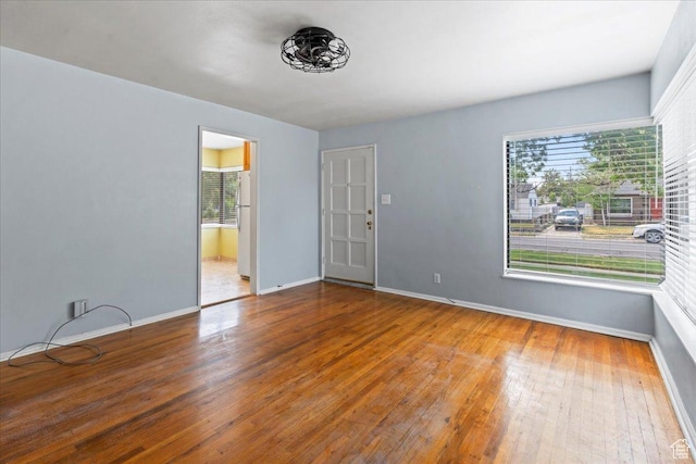 876 N 1300 W, Salt Lake City, UT 84116 - unfurnished room featuring hardwood / wood-style floors and baseboards