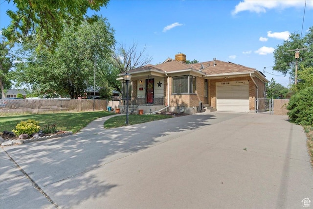 876 N 1300 W, Salt Lake City, UT 84116 - view of front facade featuring an attached garage, concrete driveway, a gate, brick siding, and a chimney