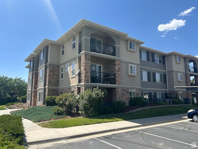 164 E Spencer Peak Way S Unit A11, Draper, UT 84020 - view of property with uncovered parking