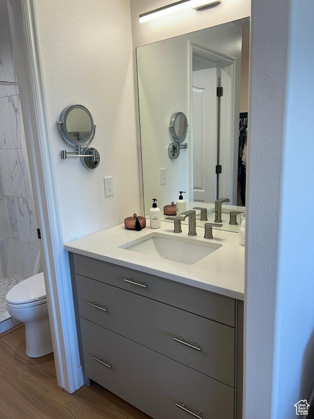 164 E Spencer Peak Way S Unit A11, Draper, UT 84020 - full bath featuring vanity, wood finished floors, and a tile shower