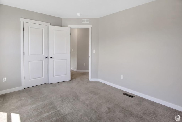 75 N Rio Grand Ave, Farmington, UT 84025 - unfurnished bedroom with carpet and a closet