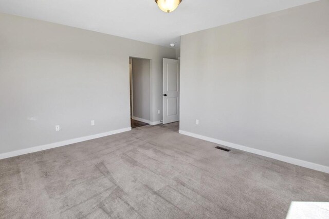 75 N Rio Grand Ave, Farmington, UT 84025 - carpeted spare room featuring baseboards