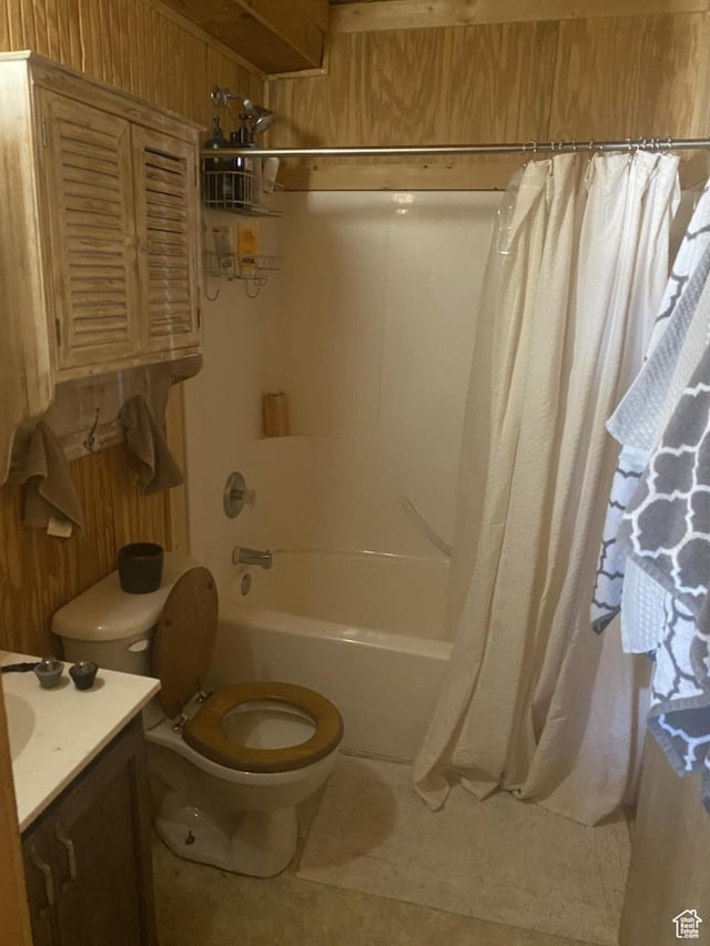9835 S Big Buck E, Duchesne, UT 84021 - bathroom featuring wood walls, vanity, shower / bath combo, and tile patterned floors