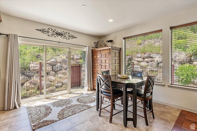 1487 E Deer Ridge Dr, Draper, UT 84020 - dining area with recessed lighting and light tile patterned floors