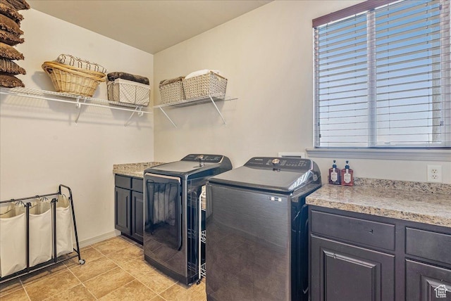 1487 E Deer Ridge Dr, Draper, UT 84020 - washroom featuring washer and dryer, cabinet space, and light tile patterned floors