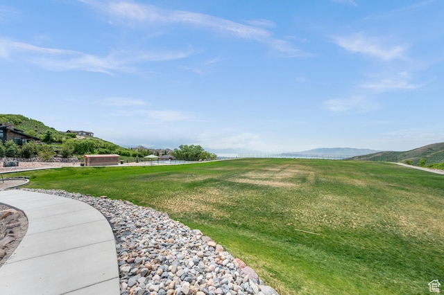 1487 E Deer Ridge Dr, Draper, UT 84020 - view of community with a yard and a water and mountain view