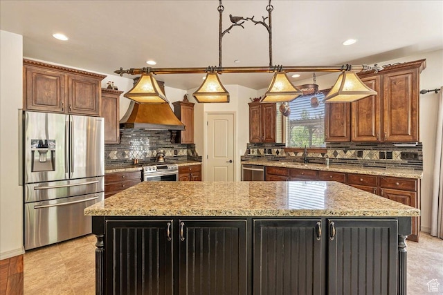 1487 E Deer Ridge Dr, Draper, UT 84020 - kitchen featuring stainless steel appliances, a center island, decorative backsplash, recessed lighting, and custom range hood