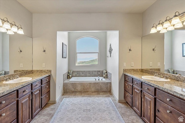 1487 E Deer Ridge Dr, Draper, UT 84020 - full bath featuring two vanities, a garden tub, and tile patterned floors