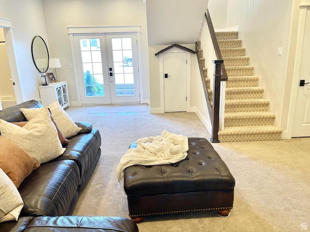 14312 S Herriman View Way, Herriman, UT 84096 - living room featuring light colored carpet, french doors, and stairs